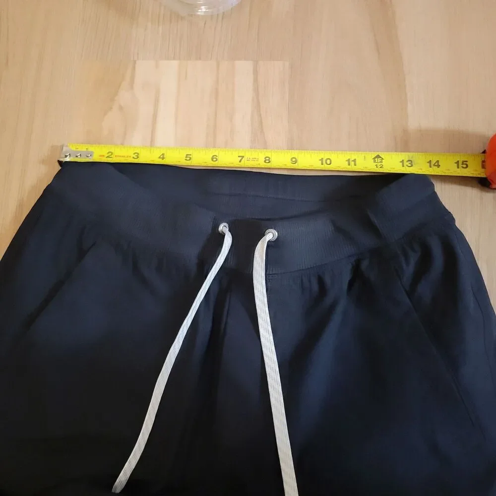 Vuori Meta Jogger Men Medium Black Drawstring Stretch Performance Pants V436